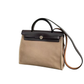 Pre-Owned Hermès Herbag Zip 31 (specifically shown here in the Retourne style) SZ3032607173667