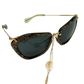 Pre-Owned Miu Miu Noir MU 10NS (also referred to as the SMU10N model) sunglasses SZ3062601152373