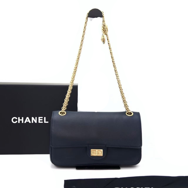 Pre-Owned CHANEL Paris-Hamburg 2.55 Nude Reissue 226 Flap Bag in navy blue limited-edition piece from the Pre-Fall 2018 Métiers d'Art collection SZ6072605121847