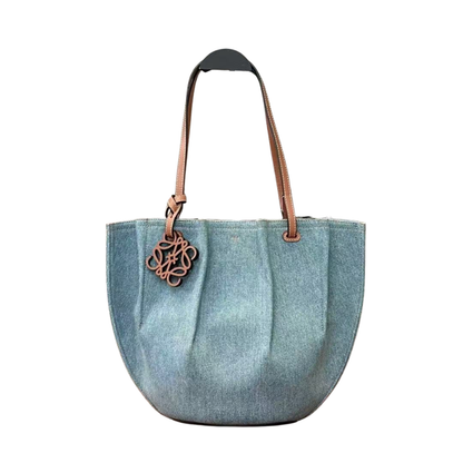 Pre-Owned Loewe x Paula’s Ibiza Small Shell Denim Tote Bag features a distinctive pleated half-moon silhouette SZ6062607234685