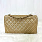 Pre-Owned Chanel Classic Flap Limited Edition Bag in Metallic Gold Quilted Lambskin, an exquisite 2015 seasonal piece with a dazzling pearl-embellished CC turn-lock N21503548