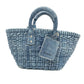 Pre-Owned Balenciaga Bistro Panier Woven Denim Basket Bag (25cm), a trendy casual tote with an adjustable denim strap and branded hang tag N24705901