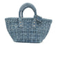 Pre-Owned Balenciaga Bistro Panier Woven Denim Basket Bag (25cm), a trendy casual tote with an adjustable denim strap and branded hang tag N24705901