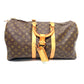 Pre-Owned Louis Vuitton Monogram Keepall 45 Bandoulière (Handheld), a vintage 1985 travel duffle bag with luggage tag and iconic Vachetta leather N24696062