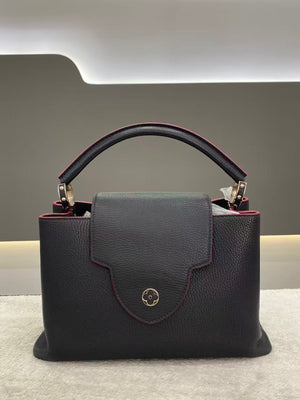 Pre-Owned Louis Vuitton Capucines Handbag in Black Taurillon Leather with Burgundy Edging, a 2016 signature top-handle bag with protective packaging intact N24716398