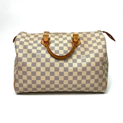 Pre-Owned Louis Vuitton Damier Ebene Speedy 35 Handbag, a durable 2013 vintage top-handle bag in brown checkerboard canvas N24724548