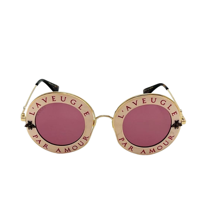 Pre-Owned Gucci GG0113S "L'Aveugle Par Amour" round-frame sunglasses SZ3042601010059