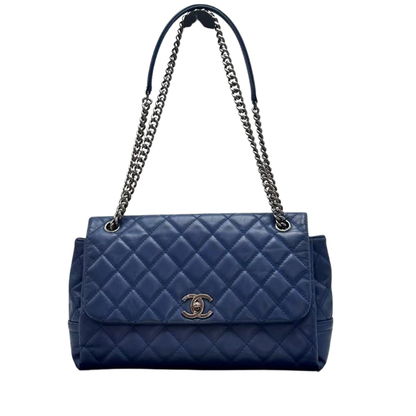 Pre-Owned  CHANEL Blue Quilted Chain Flap Bag, often part of the "In The Business" or "Stitched Covered CC" collections SZ604251030348