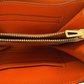 Pre-Owned Hermès Mini Convoyeur Crossbody Bag (often styled as a crossbody wallet pouch due to its highly efficient interior layout) N23913746