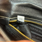 Pre-Owned Prada Saffiano long flap clutch, often referred to as a "Saffiano Frame" clutch N23374554