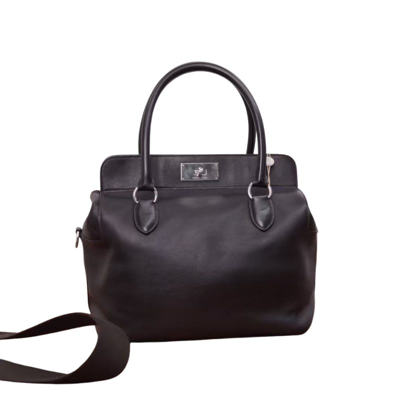 Pre-Owned  Hermès Toolbox Bag, which features an adjustable and detachable web shoulder strap. Hermès Toolbox 26 SZ3022607194030