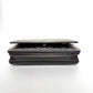 Pre-Owned Chanel WOC — Black Grained Calfskin