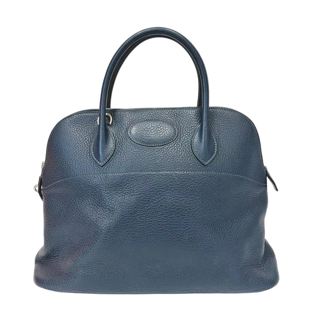 Blue leather handbag on a white background