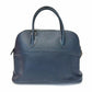 Blue leather handbag on a white background