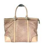 Brown handbag with beige accents on a white background