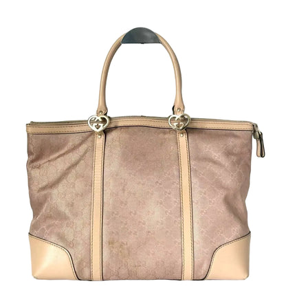 Brown handbag with beige accents on a white background
