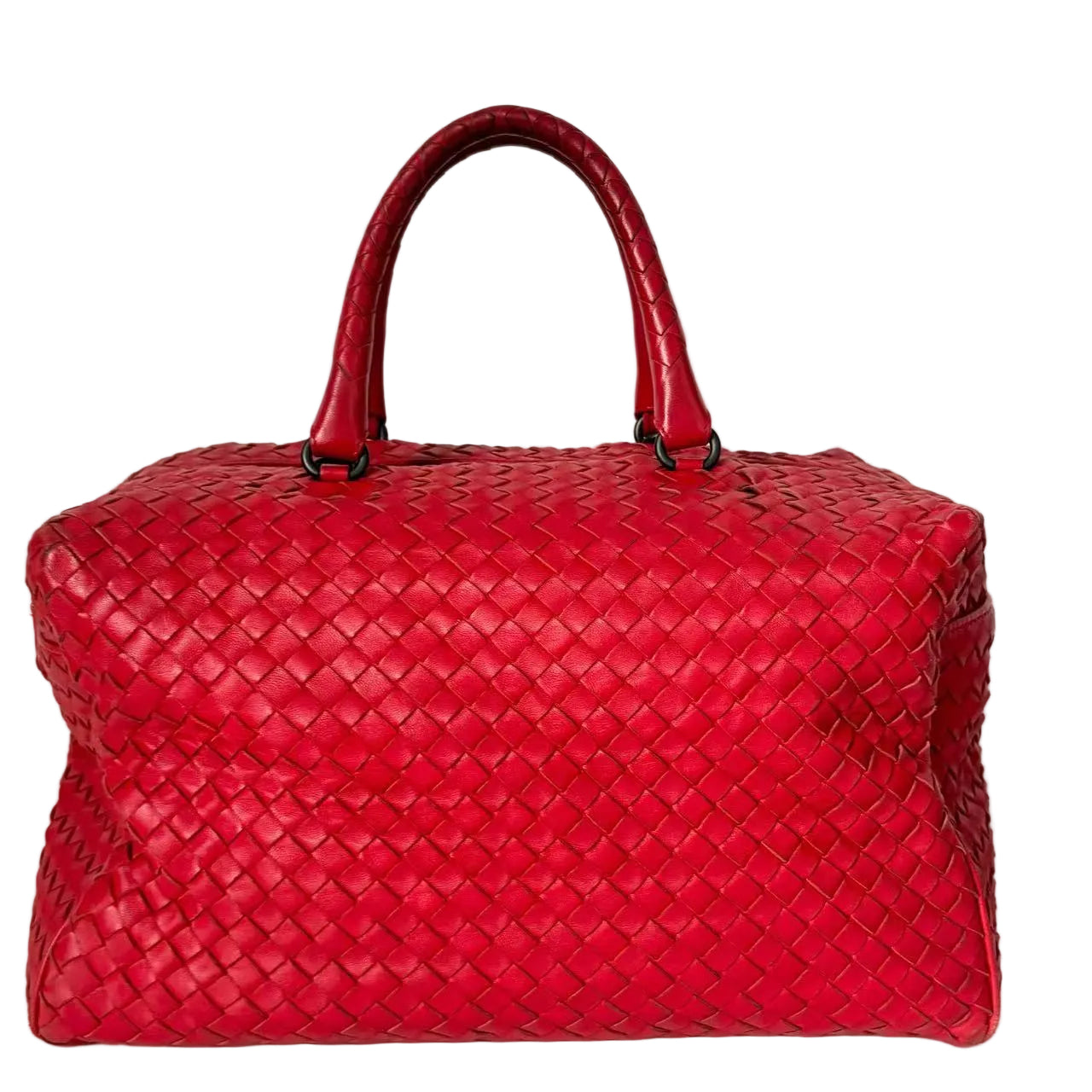 Red woven handbag on a white background