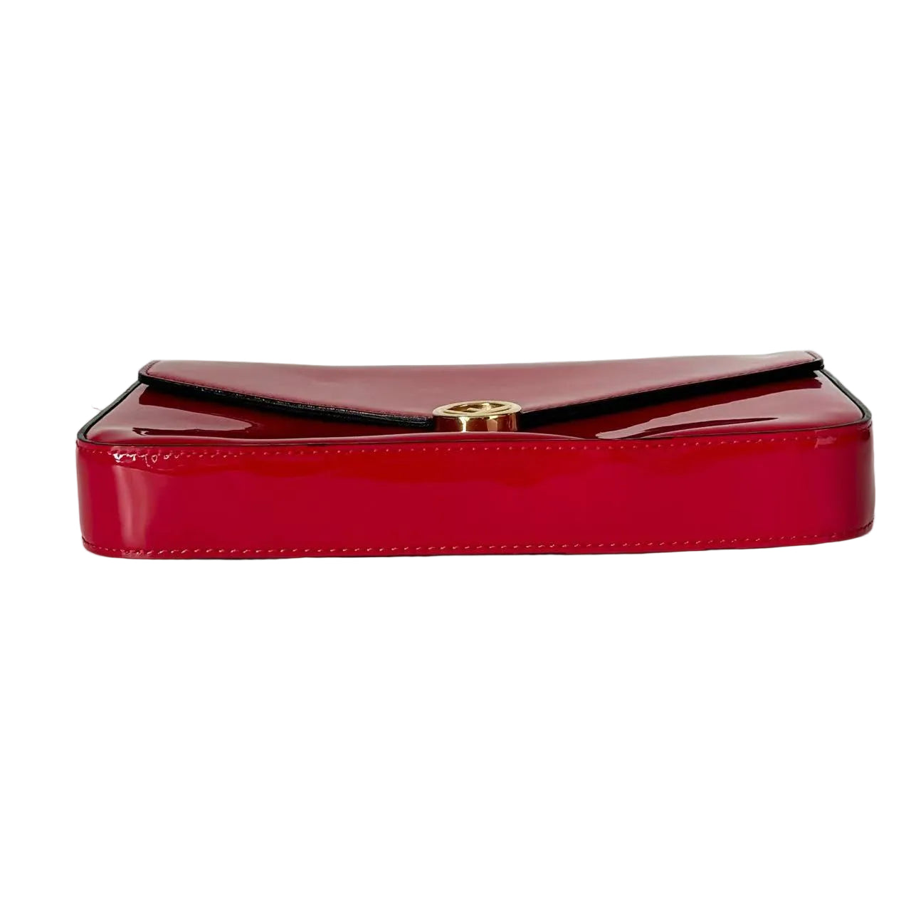 Red handbag with gold clasp on a light gray background