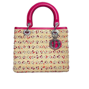 Pre-Owned Medium Lady Dior crafted from woven raffia with fuchsia leather trim N22988071