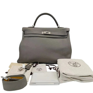 Pre-Owned Hermès Kelly 40 is a large versatile bag often used for travel or business N23297557