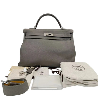 Pre-Owned Hermès Kelly 40 is a large versatile bag often used for travel or business N23297557