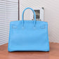 Pre-Owned Hermès Candy Blue Birkin 35 is a limited-edition piece specifically crafted in Epsom leather with Palladium hardware (silver-tone) SZ3022606213679