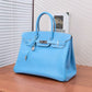 Pre-Owned Hermès Candy Blue Birkin 35 is a limited-edition piece specifically crafted in Epsom leather with Palladium hardware (silver-tone) SZ3022606213679