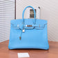 Pre-Owned Hermès Candy Blue Birkin 35 is a limited-edition piece specifically crafted in Epsom leather with Palladium hardware (silver-tone) SZ3022606213679