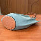 Pre-Owned Loewe x Paula’s Ibiza Small Shell Denim Tote Bag features a distinctive pleated half-moon silhouette SZ6062607234685