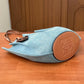 Pre-Owned Loewe x Paula’s Ibiza Small Shell Denim Tote Bag features a distinctive pleated half-moon silhouette SZ6062607234685