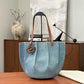Pre-Owned Loewe x Paula’s Ibiza Small Shell Denim Tote Bag features a distinctive pleated half-moon silhouette SZ6062607234685