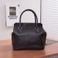 Pre-Owned  Hermès Toolbox Bag, which features an adjustable and detachable web shoulder strap. Hermès Toolbox 26 SZ3022607194030