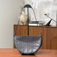 Pre-Owned Goyard Hirondelle PM bag features a distinctive crescent or half-moon silhouette SZ3052607214340