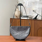 Pre-Owned Goyard Hirondelle PM bag features a distinctive crescent or half-moon silhouette SZ3052607214340