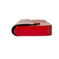 Red patent leather wallet with gold clasp on a light gray background