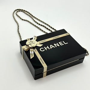 Pre-Owned CHANEL Gift Box Bag Black Plexiglass and Gold Tone Metal | Camellia Ribbon | 23076345